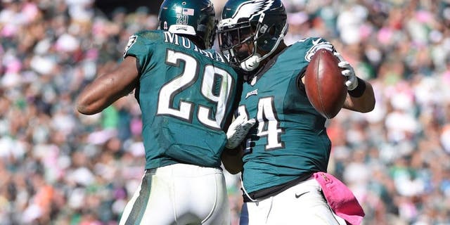 Oct 11, 2015; Philadelphia, PA, USA; Philadelphia Eagles running back DeMarco Murray (29) and running back Ryan Mathews (24) celebrate a touchdown during the third quarter against the New Orleans Saints at Lincoln Financial Field. Mandatory Credit: Eric Hartline-USA TODAY Sports