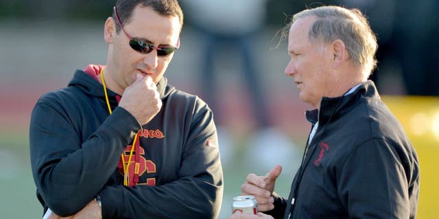 Mar 3, 2015; Los Angeles, CA, USA; Southern California Trojans coach Steve Sarkisian (left) and athletic director Pat Haden at spring practice at Cromwell Field. Mandatory Credit: Kirby Lee-USA TODAY Sports