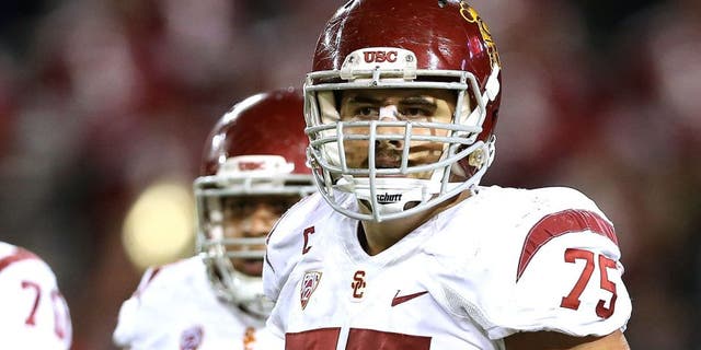 TUCSON, AZ - OCTOBER 11: Center Max Tuerk #75 of the USC Trojans during the college football game against the Arizona Wildcats at Arizona Stadium on October 11, 2014 in Tucson, Arizona. The Trojans defeatred the Wildcats 28-26. (Photo by Christian Petersen/Getty Images)