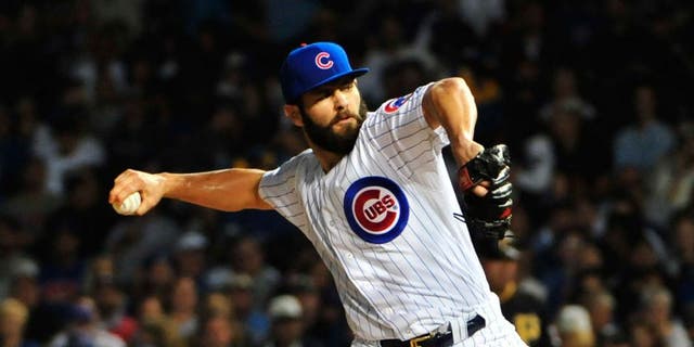 CHICAGO, IL - SEPTEMBER 27: Jake Arrieta #49 of the Chicago Cubs pitches against the Pittsburgh Pirates during the first inning on September 27, 2015 at Wrigley Field in Chicago, Illinois. (Photo by David Banks/Getty Images)