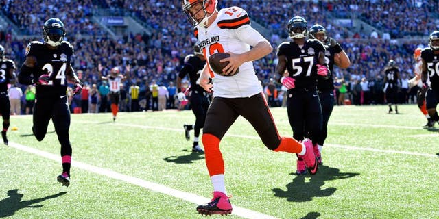 Oct 11, 2015; Baltimore, MD, USA; Cleveland Browns quarterback Josh McCown (13) scores a touchdown during the third quarter against the Baltimore Ravens at M&amp;T Bank Stadium. Mandatory Credit: Tommy Gilligan-USA TODAY Sports