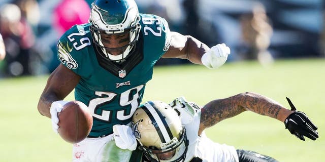 Oct 11, 2015; Philadelphia, PA, USA; Philadelphia Eagles running back DeMarco Murray (29) is tackled by New Orleans Saints strong safety Kenny Vaccaro (32) during the fourth quarter at Lincoln Financial Field. The Eagles won 39-17. Mandatory Credit: Bill Streicher-USA TODAY Sports