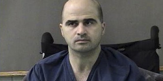 This April 9, 2010, file photo released by the Bell County Sheriffs Department shows Maj. Nidal Hasan at the Bell County Jail in Belton, Texas.