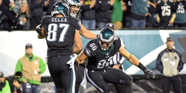 Oct 12, 2014; Philadelphia, PA, USA; Philadelphia Eagles tight end James Casey (85) celebrates his 26-yard touchdown catch with tight end Zach Ertz (86) and tight end Brent Celek (87) against the New York Giants during the second quarter at Lincoln Financial Field. Mandatory Credit: Eric Hartline-USA TODAY Sports