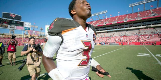 Oct 11, 2015; Tampa, FL, USA; Tampa Bay Buccaneers quarterback Jameis Winston (3) runs off the field at the end of the game against the Jacksonville Jaguars at Raymond James Stadium. The Tampa Bay Buccaneers won 38-31. Mandatory Credit: Logan Bowles-USA TODAY Sports