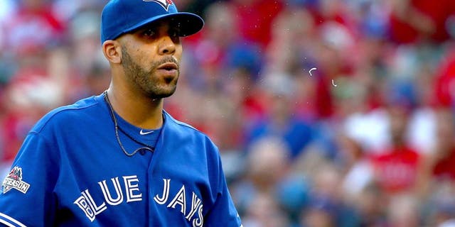 ARLINGTON, TX - OCTOBER 12: David Price #14 of the Toronto Blue Jays walks off the mound at the end of the seventh inning against the Texas Rangers in game four of the American League Division Series at Globe Life Park in Arlington on October 12, 2015 in Arlington, Texas. (Photo by Tom Pennington/Getty Images)