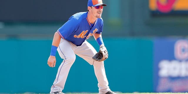 LAKE BUENA VISTA, FL - MARCH 10: Matt Reynolds #55 of the New York Mets gets ready to field the ball during the Spring Training game against the Atlanta Braves at Champion Stadium on March 10, 2015 in Lake Buena Vista, Florida. The Braves defeated the Mets 3-2. (Photo by Leon Halip/Getty Images)