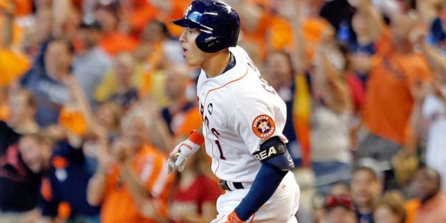 Oct 12, 2015; Houston, TX, USA; Houston Astros shortstop Carlos Correa (1) rounds the bases after hitting a solo home run against the Kansas City Royals during the third inning in game four of the ALDS at Minute Maid Park. Mandatory Credit: Thomas B. Shea-USA TODAY Sports