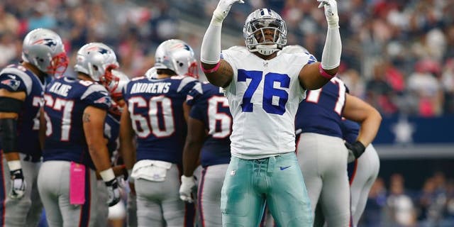 ARLINGTON, TX - OCTOBER 11: Greg Hardy #76 of the Dallas Cowboys encourages the crowd to make noise during the first half of the NFL game against the New England Patriots at AT&T Stadium on October 11, 2015 in Arlington, Texas. (Photo by Mike Stone/Getty Images)
