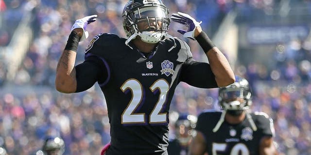 BALTIMORE, MD - OCTOBER 11: Cornerback Jimmy Smith #22 of the Baltimore Ravens runs onto the field before the start of a game against the Cleveland Browns at M&T Bank Stadium on October 11, 2015 in Baltimore, Maryland. (Photo by Patrick Smith/Getty Images)