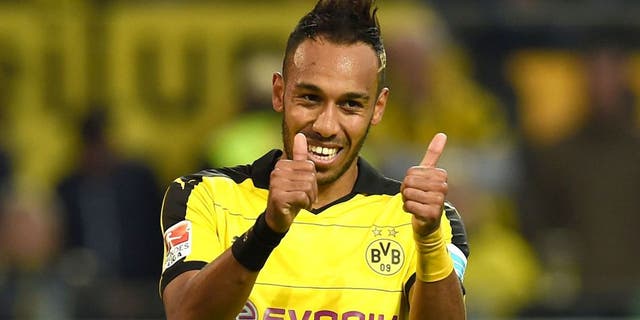 Dortmund's Gabonese striker Pierre-Emerick Aubameyang reacts during the German first division Bundesliga football match Borussia Dortmund v SV Darmstadt 98, in Dortmund, western Germany, on September 27, 2015. The match ended with a 2-2 draw. AFP PHOTO / PATRIK STOLLARZ RESTRICTIONS: DURING MATCH TIME: DFL RULES TO LIMIT THE ONLINE USAGE TO 15 PICTURES PER MATCH AND FORBID IMAGE SEQUENCES TO SIMULATE VIDEO. == RESTRICTED TO EDITORIAL USE == FOR FURTHER QUERIES PLEASE CONTACT DFL DIRECTLY AT + 49 69 650050. (Photo credit should read PATRIK STOLLARZ/AFP/Getty Images)