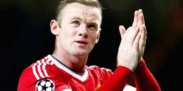 MANCHESTER, ENGLAND - SEPTEMBER 30: Wayne Rooney of Manchester United applauds the crowd after victory in the UEFA Champions League Group B match between Manchester United FC and VfL Wolfsburg at Old Trafford on September 30, 2015 in Manchester, United Kingdom. (Photo by Dean Mouhtaropoulos/Getty Images)