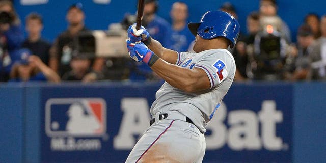 The Texas Rangers' Adrian Beltre (29) hits an RBI single during the third inning against the Toronto Blue Jays during Game 1 of the ALDS at Rogers Centre in Toronto on Thursday, Oct. 8, 2015. The Rangers won, 5-3. (Max Faulkner/Fort Worth Star-Telegram/TNS via Getty Images)
