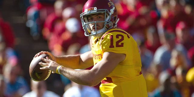 Oct 11, 2014; Ames, IA, USA; Iowa State Cyclones quarterback Sam B. Richardson (12) passes against the Toledo Rockets at Jack Trice Stadium. Mandatory Credit: Steven Branscombe-USA TODAY Sports