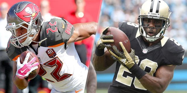 Oct 11, 2015; Tampa, FL, USA; Tampa Bay Buccaneers running back Doug Martin (22) runs for a first down during the second half of an NFL football game Jacksonville Jaguars at Raymond James Stadium. Tampa won 38-31. Mandatory Credit: Reinhold Matay-USA TODAY Sports Sep 27, 2015; Charlotte, NC, USA; New Orleans Saints running back C.J. Spiller (28) with the ball as Carolina Panthers outside linebacker Thomas Davis (58) defends in the fourth quarter. The Panthers defeated the Saints 27-22 at Bank of America Stadium. Mandatory Credit: Bob Donnan-USA TODAY Sports