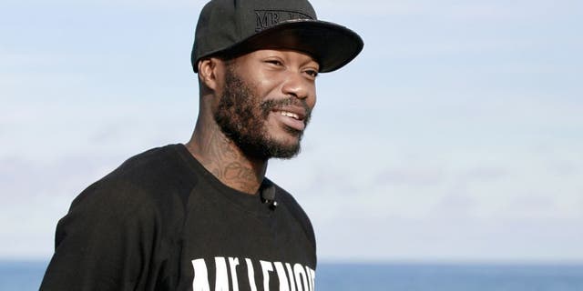 French L1 football club SC Bastia's newly recruited French forward Djibril Cisse poses on the Marana beach on January 9, 2014, outside Bastia. AFP PHOTO / PASCAL POCHARD-CASABIANCA (Photo credit should read PASCAL POCHARD CASABIANCA/AFP/Getty Images)