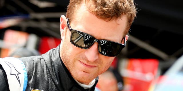 BRISTOL, TN - AUGUST 21: Kasey Kahne, driver of the #5 Great Clips Chevrolet, stands in the garage area during practice for the NASCAR Sprint Cup Series Irwin Tools Night Race at Bristol Motor Speedway on August 21, 2015 in Bristol, Tennessee. (Photo by Matt Sullivan/NASCAR via Getty Images)