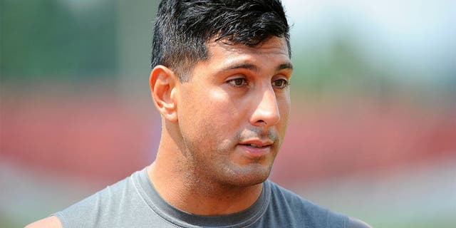 Aug 4, 2014; Cortland, NY, USA; New York Jets defensive end Jason Babin (58) speaks with the media following training camp at SUNY Cortland. Mandatory Credit: Rich Barnes-USA TODAY Sports