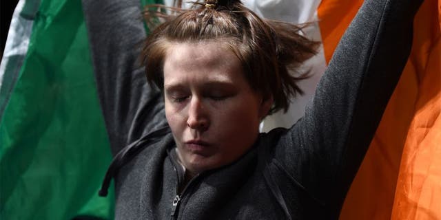 LAS VEGAS, NEVADA - DECEMBER 12: Aisling Daly prepares to enter the Octagon before facing Aisling Daly in their strawweight fight during The Ultimate Fighter Finale event inside the Pearl concert theater at the Palms Casino Resort on December 12, 2014 in Las Vegas, Nevada. (Photo by Jeff Bottari/Zuffa LLC/Zuffa LLC via Getty Images)
