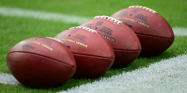 Sep 27, 2015; Glendale, AZ, USA; Footballs lie on the field prior to the game between the Arizona Cardinals and the San Francisco 49ers at University of Phoenix Stadium. Mandatory Credit: Joe Camporeale-USA TODAY Sports