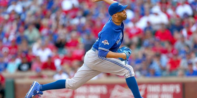 ARLINGTON, TEXAS - OCTOBER 12: David Price #14 of the Toronto Blue Jays pitches during Game 4 of the ALDS against the Texas Rangers at Globe Life Park on Monday, October 12, 2015 in Arlington, Texas. (Photo by Sarah Crabill/MLB Photos via Getty Images)