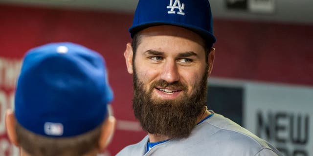 PHOENIX, AZ - SEPTEMBER 13: Scott Van Slyke #33 of the Los Angeles Dodgers talks with coach Tim Wallach #29 before a MLB game against the Arizona Diamondbacks on September 13, 2015 at Chase Field in Phoenix, Arizona. (Photo by Darin Wallentine/Getty Images)