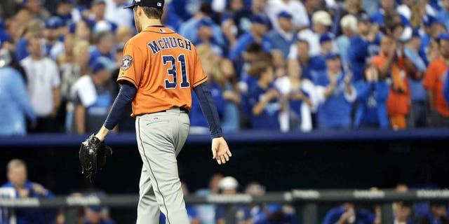 Oct 14, 2015; Kansas City, MO, USA; Houston Astros starting pitcher Collin McHugh (31) walks to the dugout after being relived against the Kansas City Royals in the fifth inning in game five of the ALDS at Kauffman Stadium. Mandatory Credit: Denny Medley-USA TODAY Sports