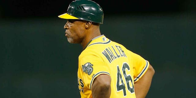 OAKLAND, CA - SEPTEMBER 9: First Base Coach Tye Waller #46 of the Oakland Athletics stands at first during the game against the Houston Astros at O.co Coliseum on September 9, 2015 in Oakland, California. The Astros defeated the Athletics 11-5. (Photo by Michael Zagaris/Oakland Athletics/Getty Images)