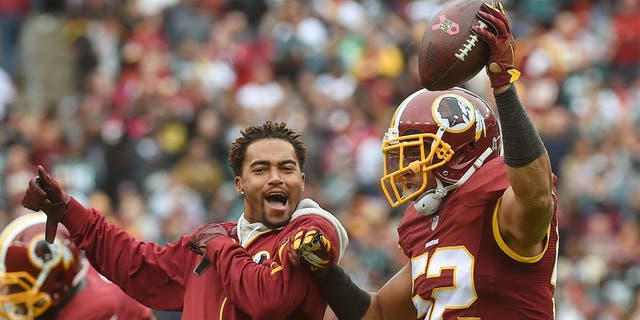 LANDOVER, MD- OCTOBER 4: CAPTION CORRECTION Washington Redskins wide receiver DeSean Jackson (11), left, joins Washington Redskins inside linebacker Keenan Robinson (52) as he celebrates his second-quarter fumble recovery in the game between the Washington Redskins and the Philadelphia Eagles at FedEx Field on Sunday, October 4, 2015. (Photo by Toni L. Sandys/ The Washington Post via Getty Images)