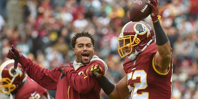 LANDOVER, MD- OCTOBER 4: CAPTION CORRECTION Washington Redskins wide receiver DeSean Jackson (11), left, joins Washington Redskins inside linebacker Keenan Robinson (52) as he celebrates his second-quarter fumble recovery in the game between the Washington Redskins and the Philadelphia Eagles at FedEx Field on Sunday, October 4, 2015. (Photo by Toni L. Sandys/ The Washington Post via Getty Images)