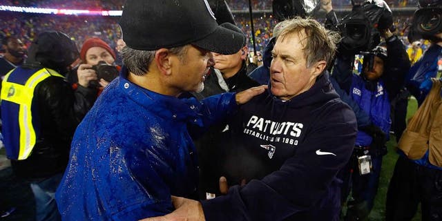 FOXBORO, MA - JANUARY 18: Head coach Chuck Pagano of the Indianapolis Colts and head coach Bill Belichick of the New England Patriots shake hands after the 2015 AFC Championship Game at Gillette Stadium on January 18, 2015 in Foxboro, Massachusetts. The Patriots defeated the Colts 45-7. (Photo by Jared Wickerham/Getty Images)