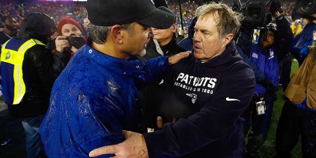 FOXBORO, MA - JANUARY 18: Head coach Chuck Pagano of the Indianapolis Colts and head coach Bill Belichick of the New England Patriots shake hands after the 2015 AFC Championship Game at Gillette Stadium on January 18, 2015 in Foxboro, Massachusetts. The Patriots defeated the Colts 45-7. (Photo by Jared Wickerham/Getty Images)
