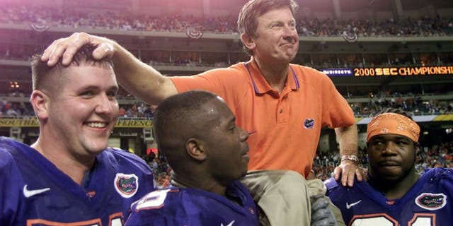 (Head coach Steve Spurrier of the Florida Gators is carried off the field by players following the Gators'' 28-6 victory over Auburn to win the Southeastern Conference (SEC) Championship at the Georgia Dome in Atlanta, Georgia. (Jamie Squire/ALLSPORT)