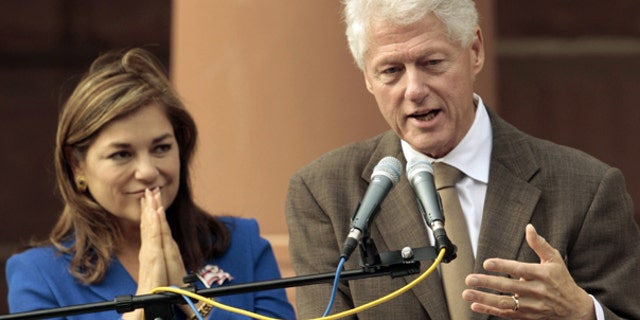 Oct. 15: Former U.S. President Bill Clinton campaigns for Rep. Loretta Sanchez, D-Calif. outside the Old Orange County Courthouse in Santa Ana, Calif.