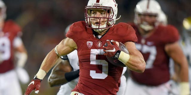 PALO ALTO, CA - OCTOBER 15: Christian McCaffrey #5 of the Stanford Cardinal's rushes for a twenty eight yard touchdown run against the UCLA Bruins in the second quarter of an NCAA football game at Stanford Stadium on October 15, 2015 in Stanford, California. (Photo by Thearon W. Henderson/Getty Images)