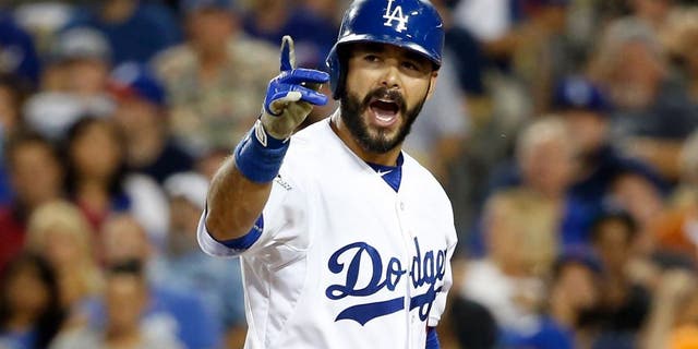 LOS ANGELES, CA - OCTOBER 09: Andre Ethier #16 of the Los Angeles Dodgers reacts after striking out to home plate umpire Alan Porter #64 in game one of the National League Division Series against the New York Mets at Dodger Stadium on October 9, 2015 in Los Angeles, California. (Photo by Sean M. Haffey/Getty Images)