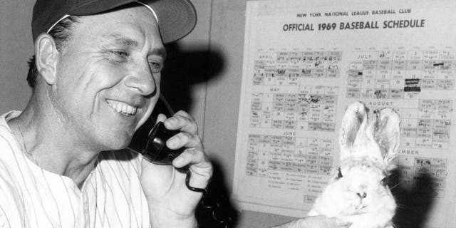 FLUSHING, NY - SEPTEMBER 8: Manager Gil Hodges of the New York Mets rubs a stuffed rabbit following the game against the Chicago Cubs on September 8, 1969 at Shea Stadium in Flushing, New York. (Photo by B Bennett/Getty Images)