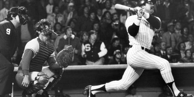 BRONX, NY - OCTOBER 18: Reggie Jackson of the New York Yankees hits his third consecutive home run of the game against the Los Angeles Dodgers in the eight inning of Game six of the 1977 World Series at Yankee Stadium on October 18, 1977 in the Bronx, New York. The Yankees defeated the Dodgers 8-4 and won the World Series four games to two. (Photo by Louis Requena/MLB Photos via Getty Images)