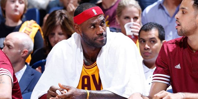 CINCINNATI, OH - OCTOBER 7: LeBron James #23 of the Cleveland Cavaliers looks on against the Atlanta Hawks during a preseason game at Cintas Center on October 7, 2015 in Cincinnati, Ohio. The Hawks defeated the Cavaliers 98-96. NOTE TO USER: User expressly acknowledges and agrees that, by downloading and or using the photograph, User is consenting to the terms and conditions of the Getty Images License Agreement. (Photo by Joe Robbins/Getty Images)