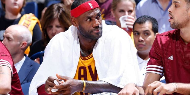 CINCINNATI, OH - OCTOBER 7: LeBron James #23 of the Cleveland Cavaliers looks on against the Atlanta Hawks during a preseason game at Cintas Center on October 7, 2015 in Cincinnati, Ohio. The Hawks defeated the Cavaliers 98-96. NOTE TO USER: User expressly acknowledges and agrees that, by downloading and or using the photograph, User is consenting to the terms and conditions of the Getty Images License Agreement. (Photo by Joe Robbins/Getty Images)