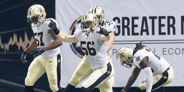 NEW ORLEANS, LA - OCTOBER 15: Michael Mauti #56 of the New Orleans Saints reacts to a touchdown folllowing a blocked punt during the first quarter of a game against the Atlanta Falcons at the Mercedes-Benz Superdome on October 15, 2015 in New Orleans, Louisiana. (Photo by Sean Gardner/Getty Images)