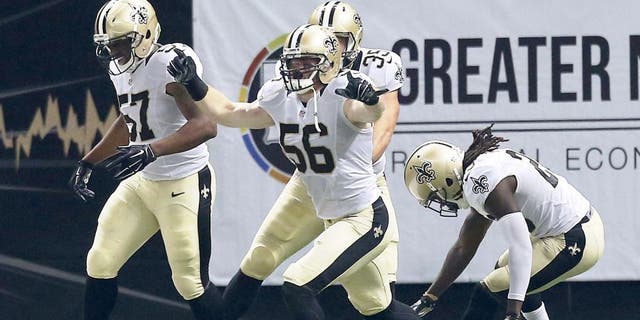 NEW ORLEANS, LA - OCTOBER 15: Michael Mauti #56 of the New Orleans Saints reacts to a touchdown folllowing a blocked punt during the first quarter of a game against the Atlanta Falcons at the Mercedes-Benz Superdome on October 15, 2015 in New Orleans, Louisiana. (Photo by Sean Gardner/Getty Images)