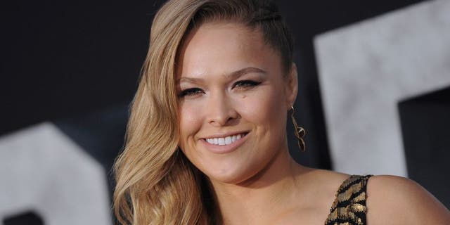 HOLLYWOOD, CA - AUGUST 11: Actress/MMA fighter Ronda Rousey arrives at the Los Angeles premiere of 'The Expendables 3' at TCL Chinese Theatre on August 11, 2014 in Hollywood, California. (Photo by Axelle/Bauer-Griffin/FilmMagic)