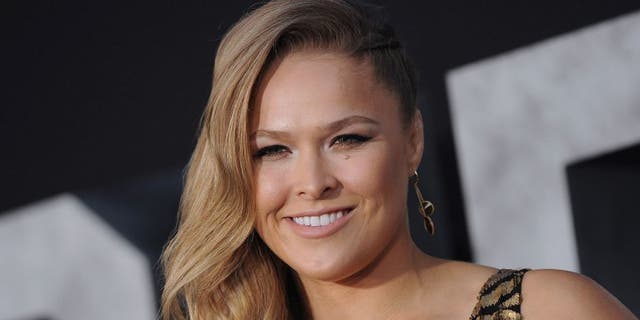 HOLLYWOOD, CA - AUGUST 11: Actress/MMA fighter Ronda Rousey arrives at the Los Angeles premiere of 'The Expendables 3' at TCL Chinese Theatre on August 11, 2014 in Hollywood, California. (Photo by Axelle/Bauer-Griffin/FilmMagic)