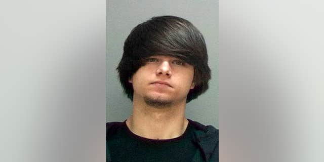 This undated photo provided by the Salt Lake County Jail shows Cody Jackson. Authorities say Jackson, an Ohio man on an electronic monitor in a pending criminal case had a 14-year-old girl dropped off at his home by taxi, held her captive for months and raped her.
