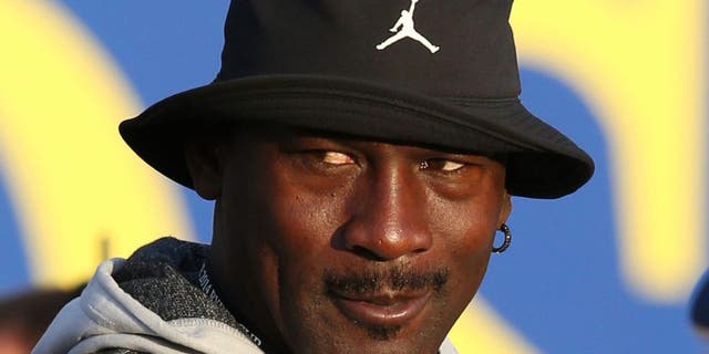 Sep 27, 2014; Auchterarder, Perthshire, SCT; NBA legend Michael Jordan watches the players tee off on hole one during day two of the 2014 Ryder Cup at Gleneagles Resort - PGA Centenary Course. Mandatory Credit: Brian Spurlock-USA TODAY Sports