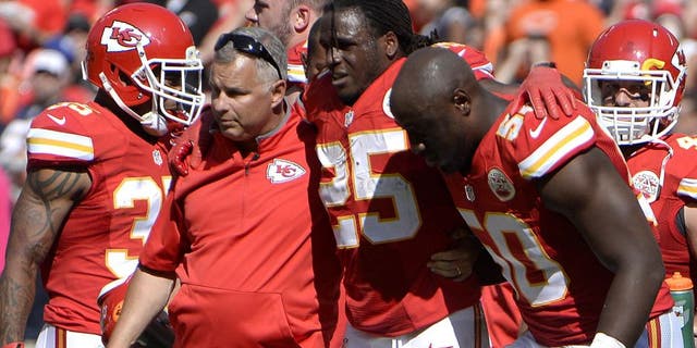 Oct 11, 2015; Kansas City, MO, USA; Kansas City Chiefs running back Jamaal Charles (25) is helped off the field against the Chicago Bears in the second half at Arrowhead Stadium. Chicago won the game 18-17. Mandatory Credit: John Rieger-USA TODAY Sports