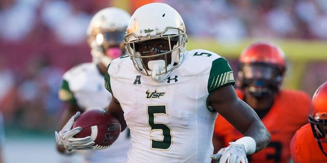 Oct 10, 2015; Tampa, FL, USA; South Florida Bulls running back Marlon Mack (5) runs for a touchdown in the third quarter against the Syracuse Orange at Raymond James Stadium. The South Florida Bulls won 45-24. Mandatory Credit: Logan Bowles-USA TODAY Sports