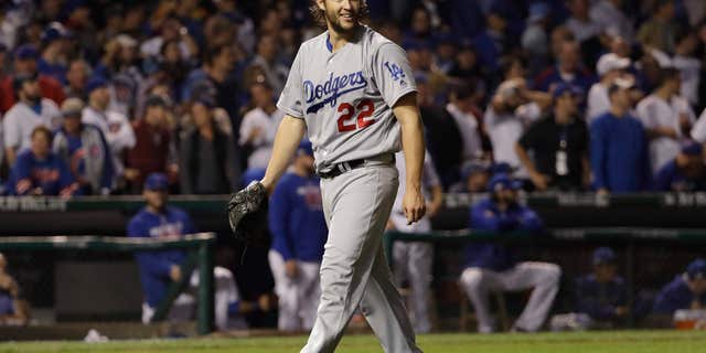 Los Angeles Dodgers starting pitcher Clayton Kershaw (22) reacts as he walks off the mound after the seventh inning of Game 2 of the National League baseball championship series against the Chicago Cubs, Sunday, Oct. 16, 2016, in Chicago.