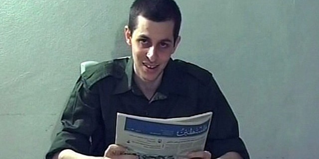 Captured Israeli soldier Gilad Shalit is seen in this file photo of a video grab released on October 2, 2009 by Israeli television. Israel has softened its terms for a prisoner swap with Hamas and the two enemies are nearing a deal to exchange hundreds of Palestinian inmates for Shalit, an Israeli soldier held in the Gaza Strip, officials said on November 23, 2009. REUTERS/Handout/Files (POLITICS CONFLICT) FOR EDITORIAL USE ONLY. NOT FOR SALE FOR MARKETING OR ADVERTISING CAMPAIGNS